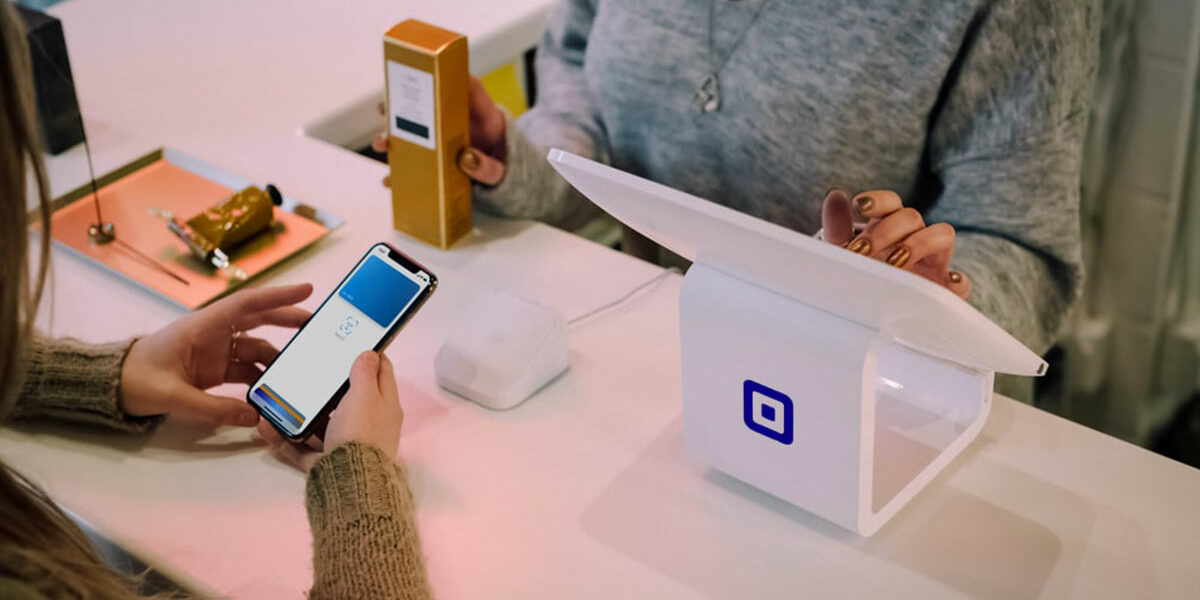 Paying with smartphone in a shop
